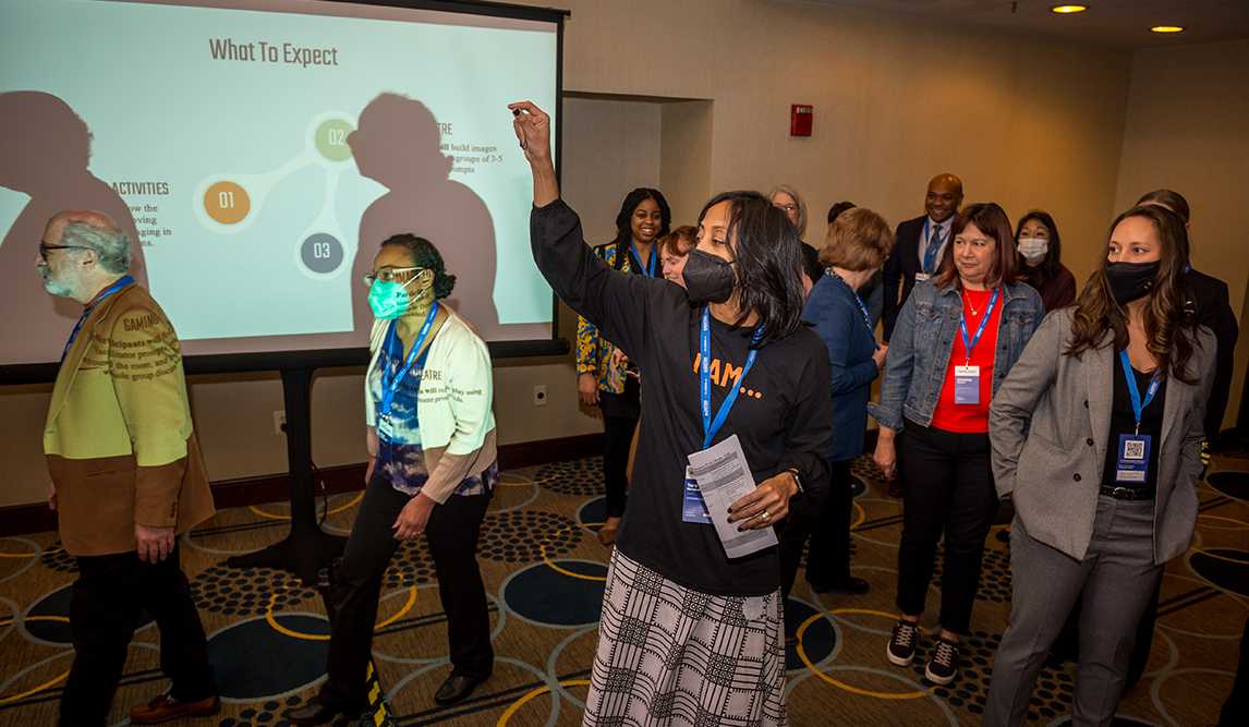 Dr. Tara Nkrumah facilitates a learning session using dramatization techniques during the 2023 DoD STEM Technical Exchange in Washington, DC.